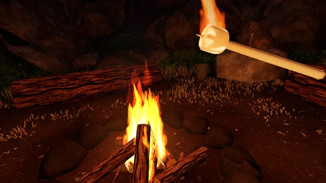 A marshmallow on a stick, toasting over the campfire in its ring of stones.